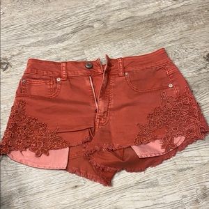 Red American Eagle Jean shorts.